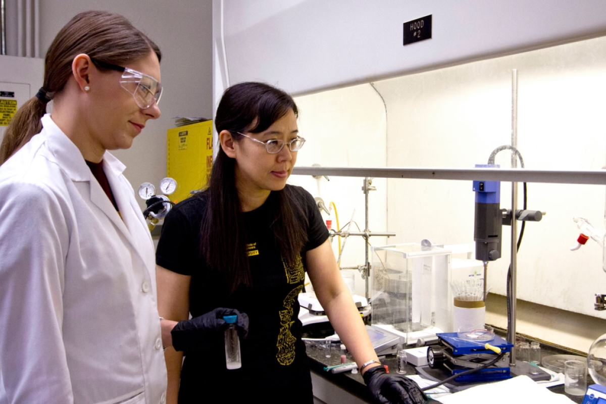 microengineering student and professor in lab